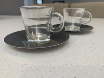 2 espresso cups by nespresso with saucers