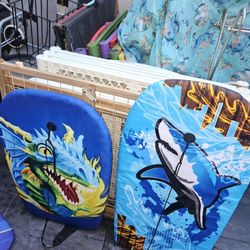 4 BOOGIE BOARDS. $5 AND $10