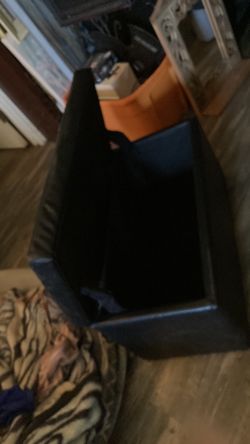 Black storage with vinyl seat
