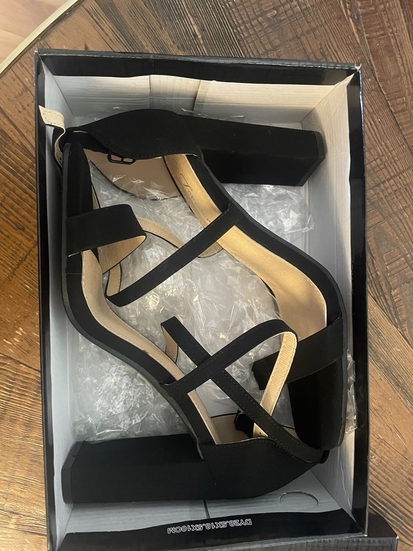 women’s black heels. size 8.5 brand new. never worn.