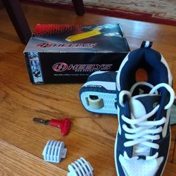 Walk ,Run and Roll Shoe. with removable wheel in the heel Size 4