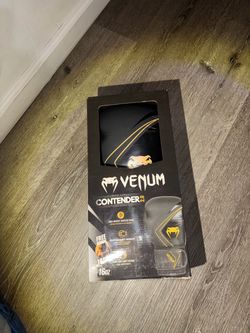 Venum boxing gloves—16oz