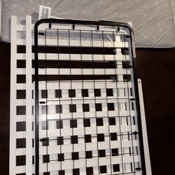 White Baby Crib With A Mattress