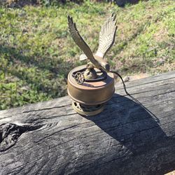 Vintage brass musical rotating eagle