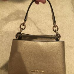 Michael Kors gold mini handbag