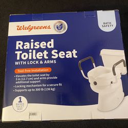 Raised Toilet Seat With Lock And Arms 
