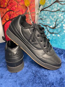 Fila Black Low-Top Sneakers with Gum Sole, men’s size 14. ( pre-owned) in great condition.