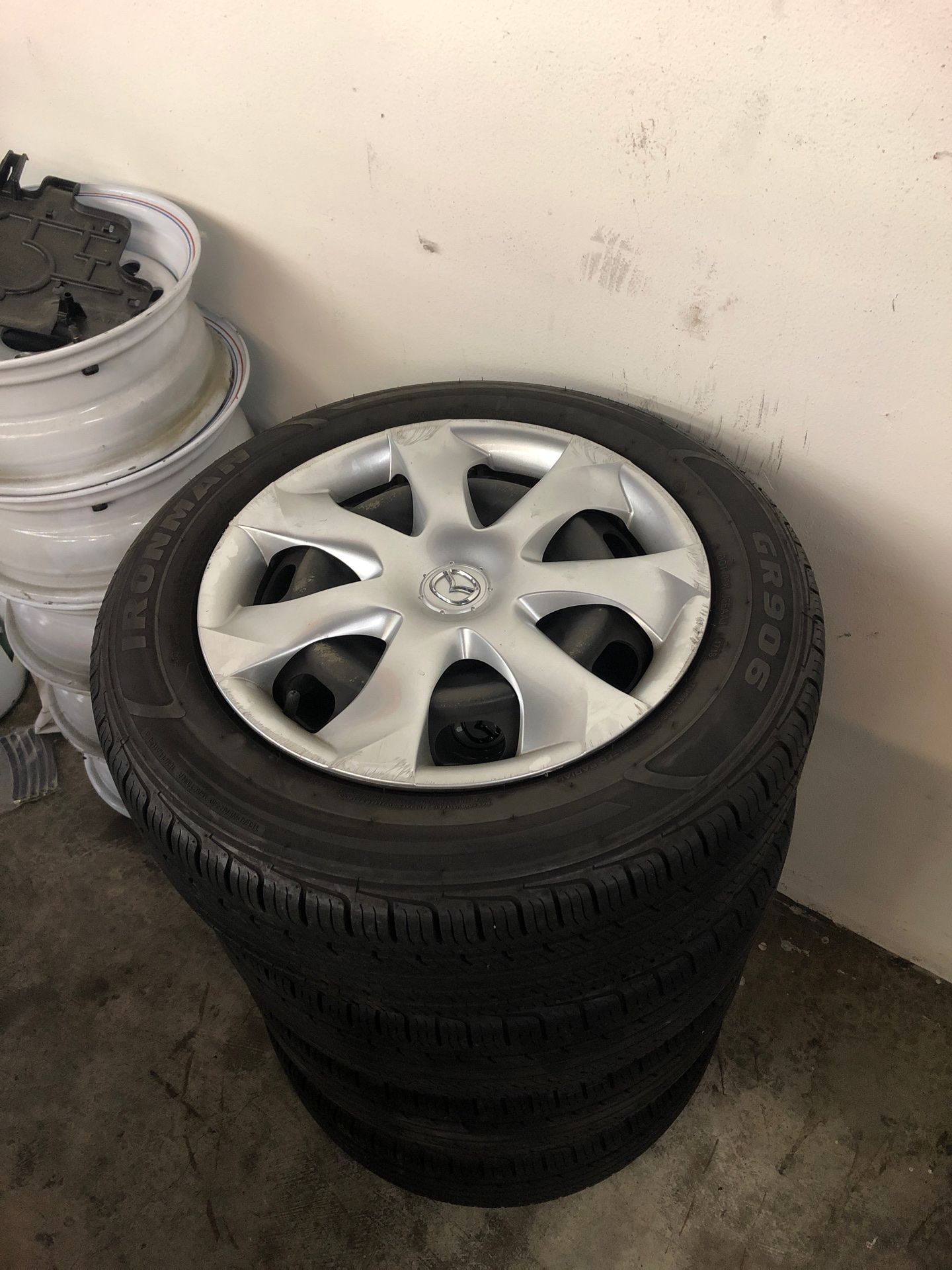 Mazda 3 stock wheels and tires with hubcaps