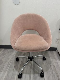 Pink swivel chair