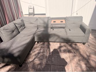 Gray L-Shaped Sectional Sofa with Cup Holders Used