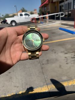 Mens Nixons Gold Watch