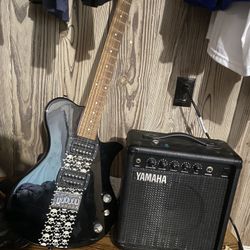 electric guitar with amp