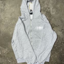 Corteiz Island Puff Print Zip Hoodie – Light Grey (Size M)