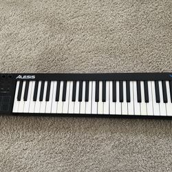 Alesis V49, a 49-key USB-MIDI keyboard controller designed for music production and performance