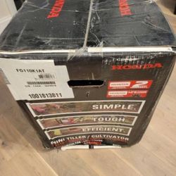 Honda 9 in. 25 cc 4-Cycle Middle Tine Forward-Rotating Gas Mini Tiller-Cultivator