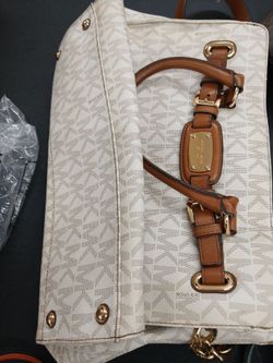 White and brown MK purse