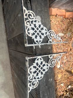 White cast-iron shelf brackets