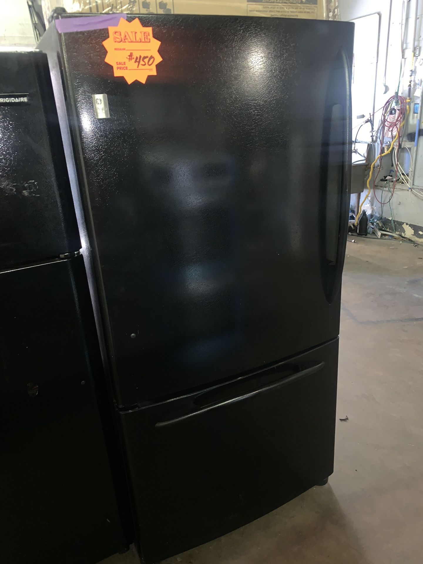 GE 33in. Bottom freezer refrigerator in excellent conditions with 4 months warranty