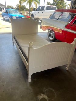 Twin bed frame with mattress