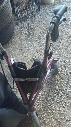 Walker with a bag with brakes