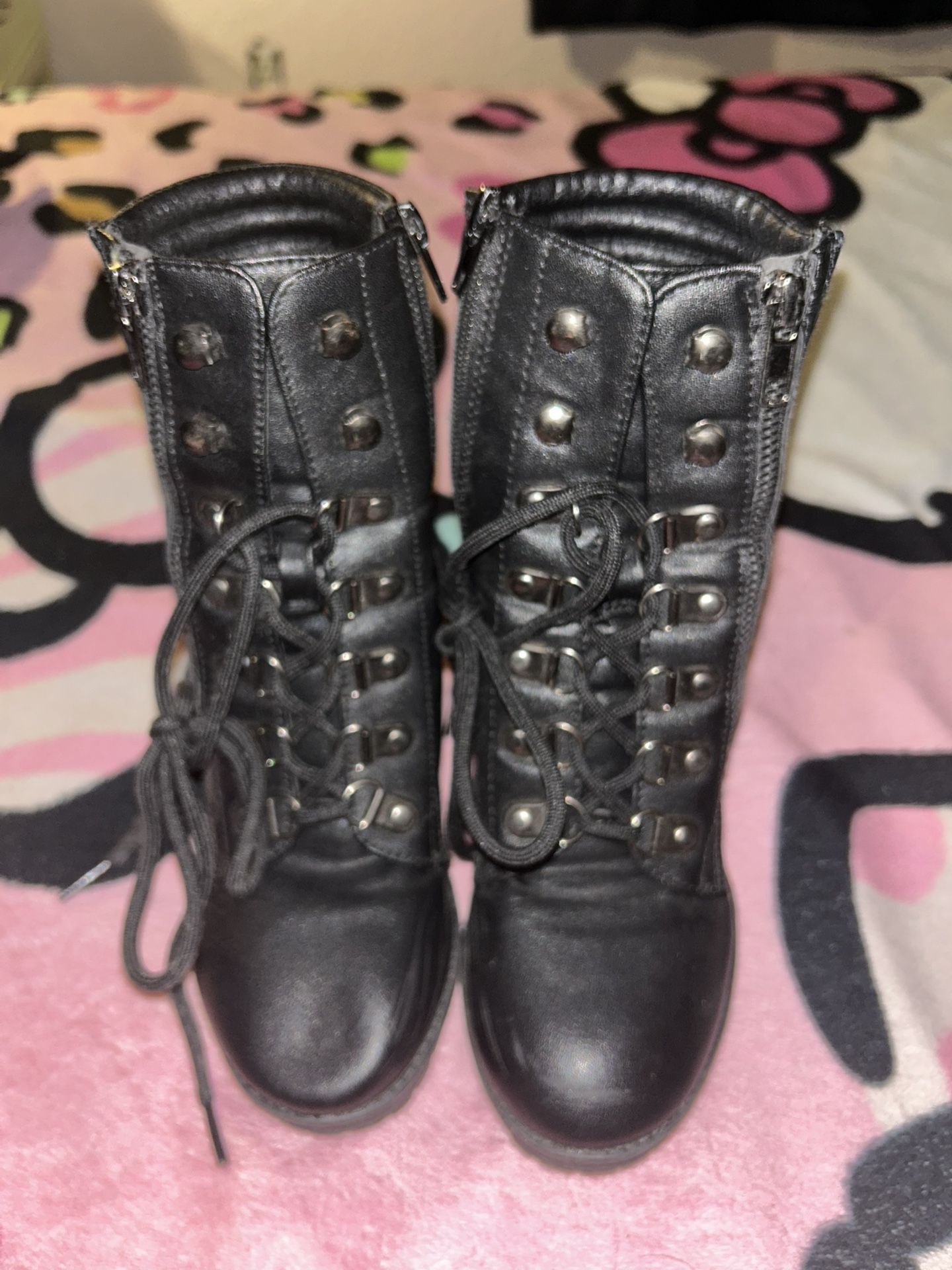 Women’s Black high heeled boots size 7