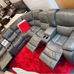 Winter Clearance Sale. Madrid Gray Leather Modular Reclining Sectional Only $1599. Easy Finance Option. Same-Day Delivery.