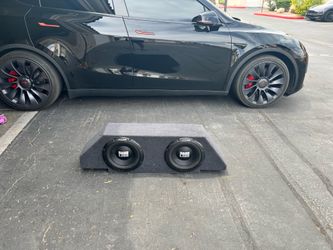 Alpine 12 inch subs . Enclosed in custom box for Camaro