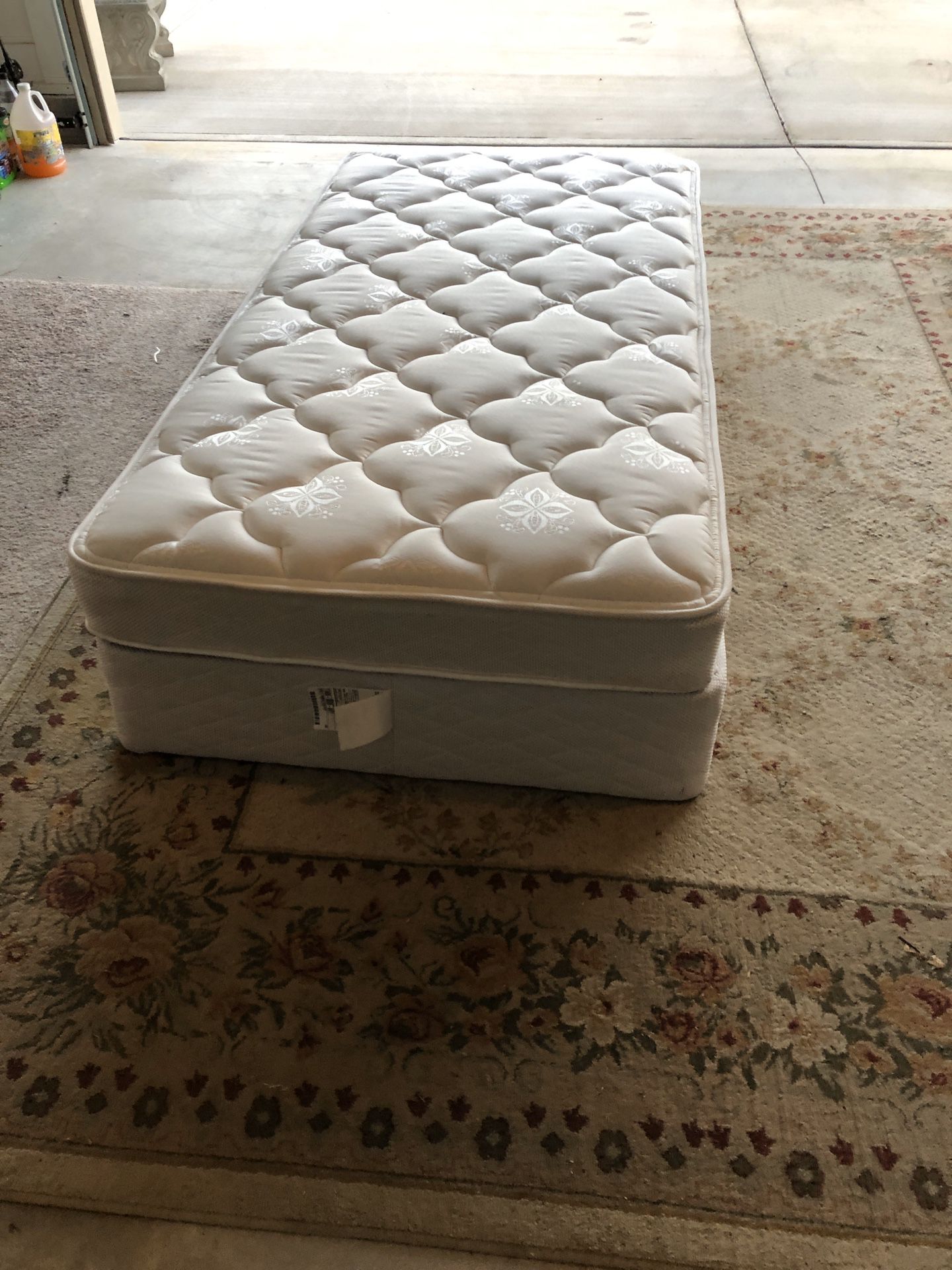 Twin size mattress, box spring and bed frame