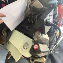 Cricut, Some tools, And Heat Press.  