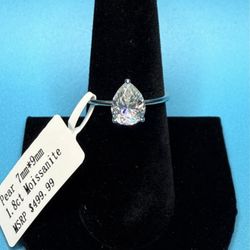# 64- Stunning 1.8 Carat Pear-Shaped Moissanite Ring Size 7