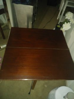 Beautiful antique solid wood folding table. Its beautiful!!! 60$ selling cheap due to needing the space. Only serious people please