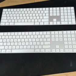 Two fully functional Mac magic keyboards