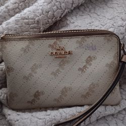 Coach Corner Zip Wristlet in the Horse and Carriage Print