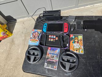 Nintendo switch with dock, games etc