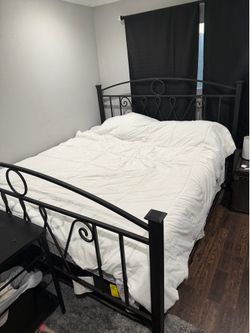 Black metal frame Cal. King bed