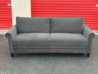 Grey/Faded black Couch