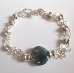 Silver plated wire wrap bracelet with brilliant crystal bead; Jewelry