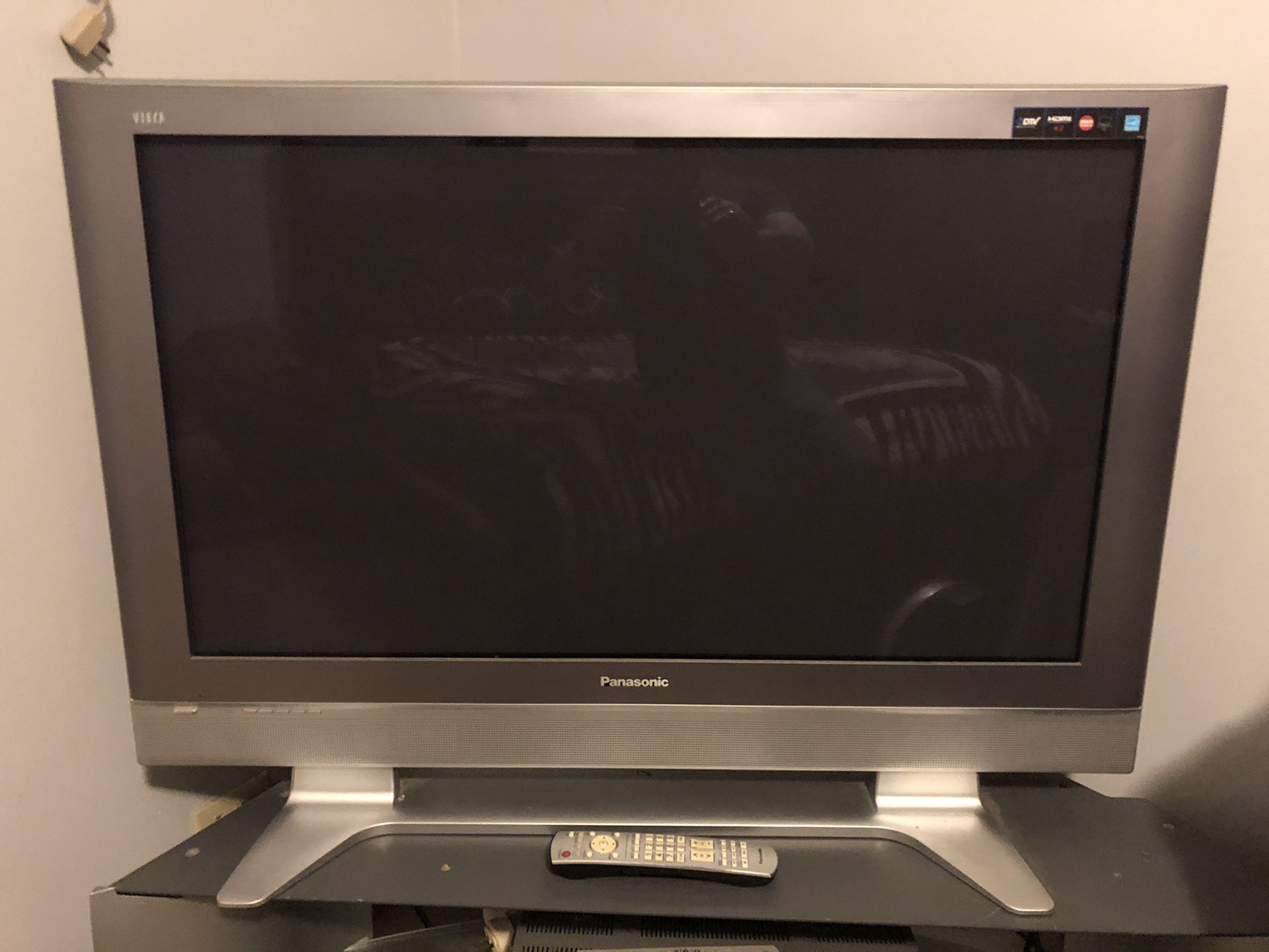 Panasonic silver42” plasma TV. With tv stand siver $150