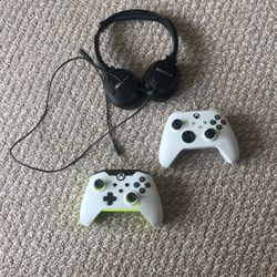 Two Xbox Controllers With Headphone