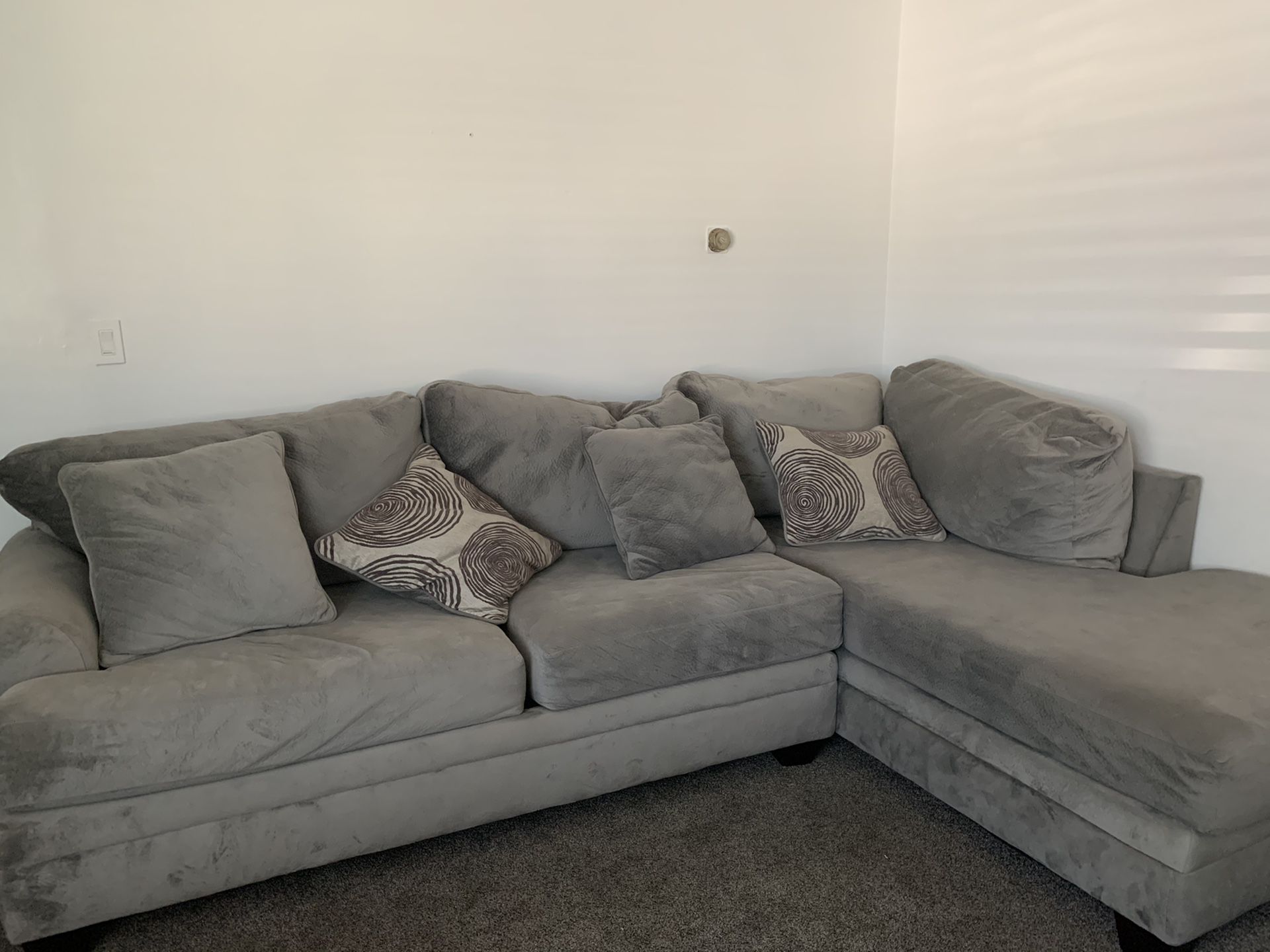 Grey sectional right side and round accent chair