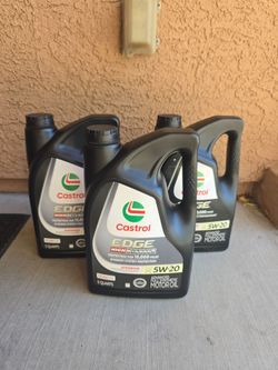 Castrol EDGE High Mileage 5W-20 Advanced Full Synthetic Motor Oil (5 Quarts), designed for vehicles with over 75,000 miles.
