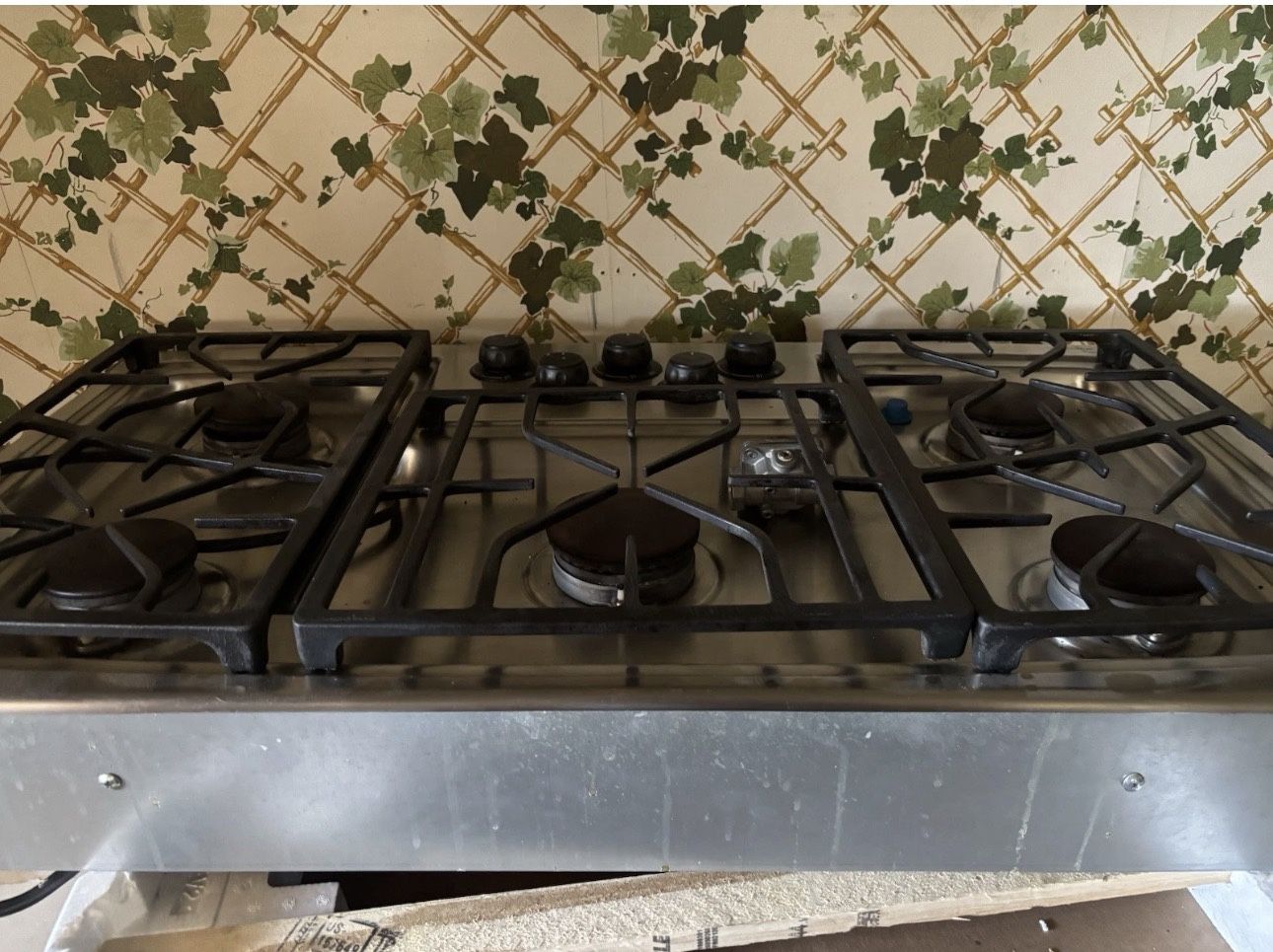 GE Monogram 36" Natural Gas Stainless Steel Cooktop. Model ZGU375NSD3SS