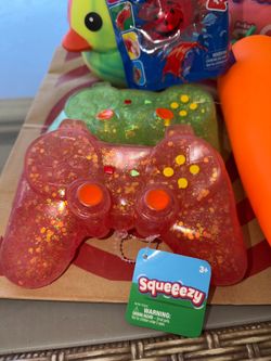 Squeeezy squishy game controller toy