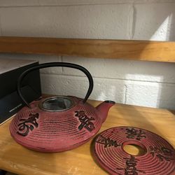 Japanese-style red cast iron teapot