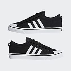 Adidas Nizza Size 11 Men’s or women size 12.5 Canvas Low Top Sneakers Black White
