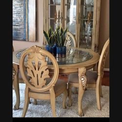 Selling a table and 4 chairs for $300, in good condition.