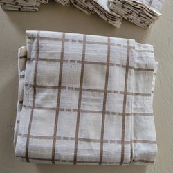 60x80 beige white  tablecloth and 12 matching napkins.  $10