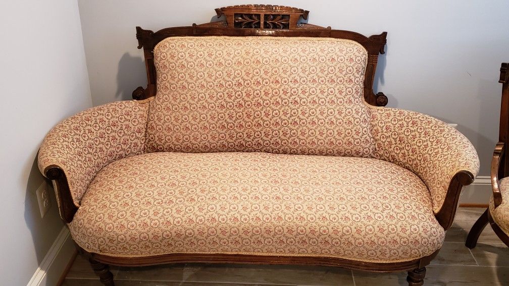 Antique sofa with matching rocking and two chairs