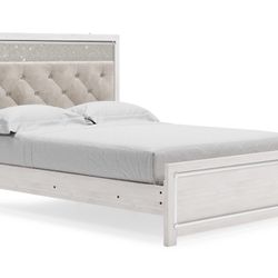 Altyra Queen Panel Bed with Upholstered Headboard