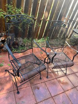 Wrought iron rocker chairs